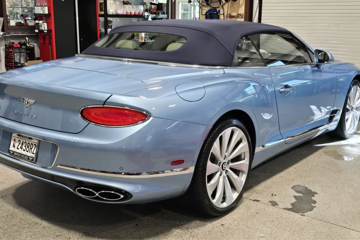 Bentley convertible rear view with blue exterior