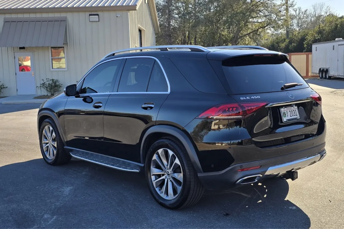 Black car parked outside with glossy finish