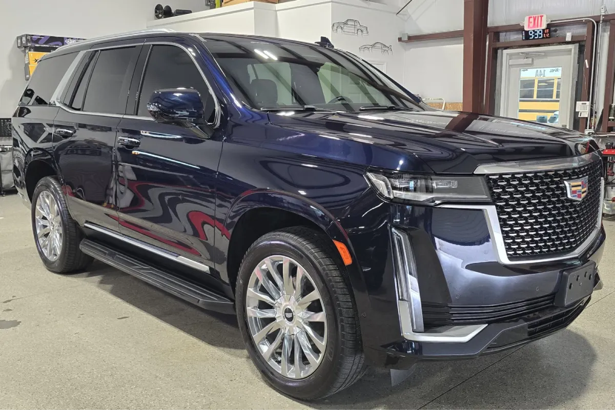 Front view of Cadillac Escalade after professional paint correction.