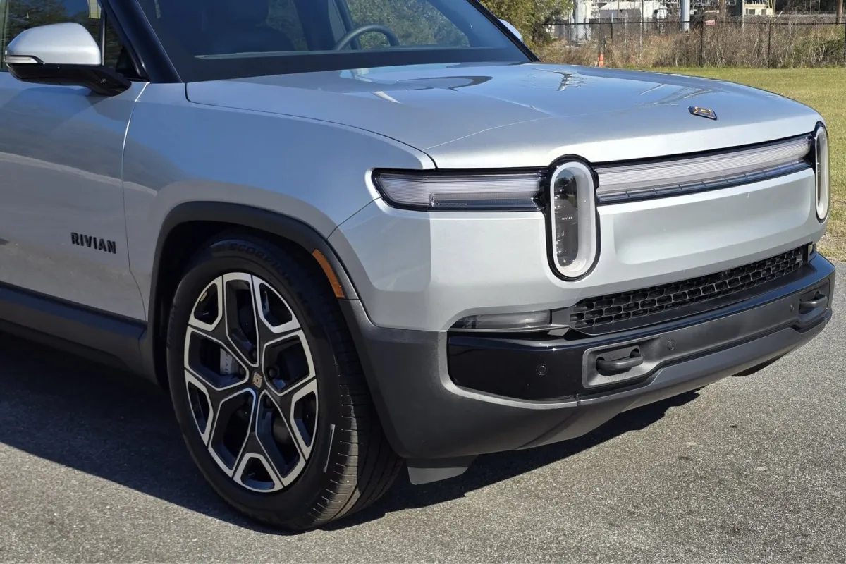 Silver Rivian truck showing paint protection film finish.