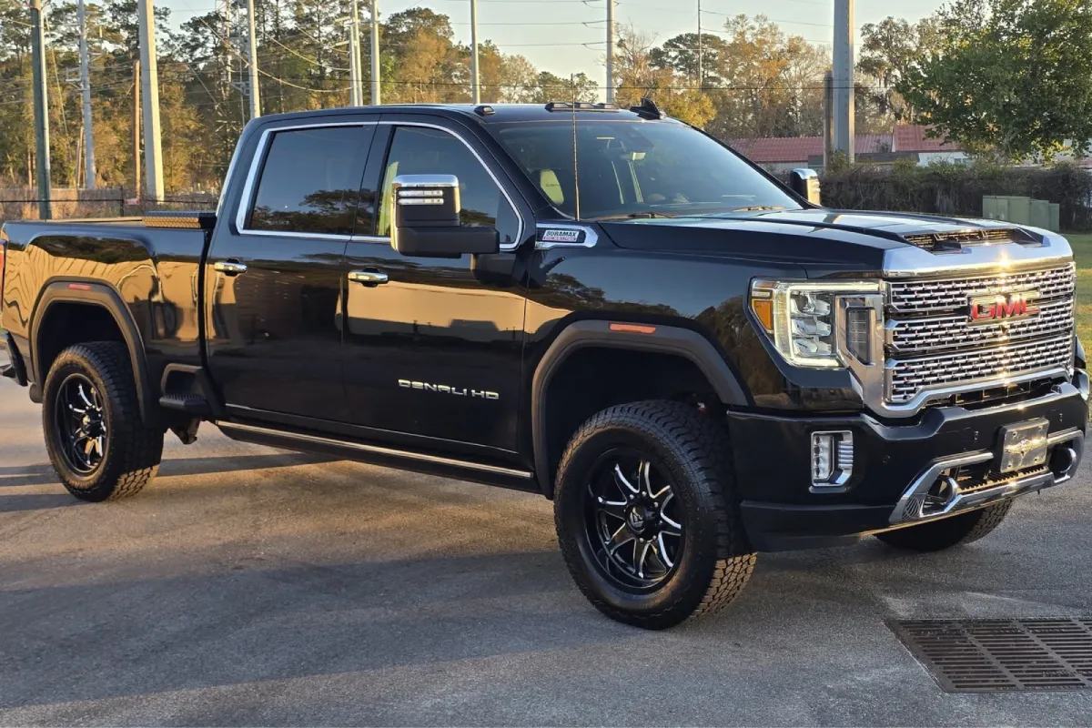 Black GMC truck with glossy ceramic coating