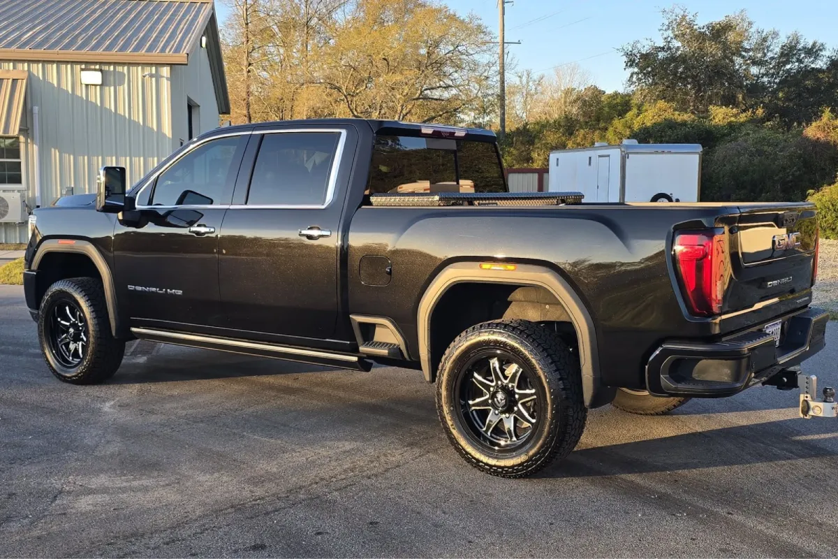 Ceramic coated black GMC truck with shiny finish